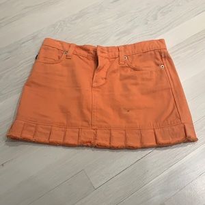 Juicy couture Jean’s  mini skirt in light orange size M
